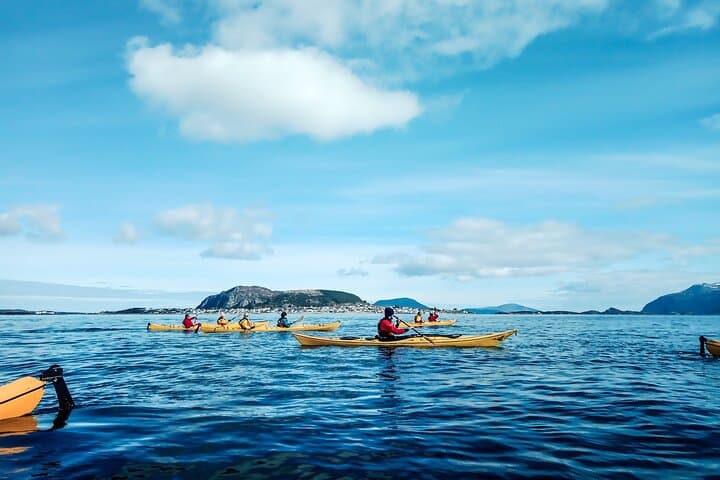 Sea Kayaking in Ålesund: Paddle the Art Nouveau Coastline at Sunset