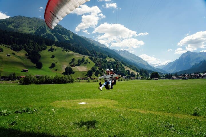Soar Together Over Klosters: Tandem Paragliding for Two with Photos photo 4
