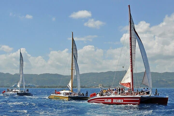 Montego Bay Catamaran Cruise: Snorkel Clear Reefs with Private Transfers