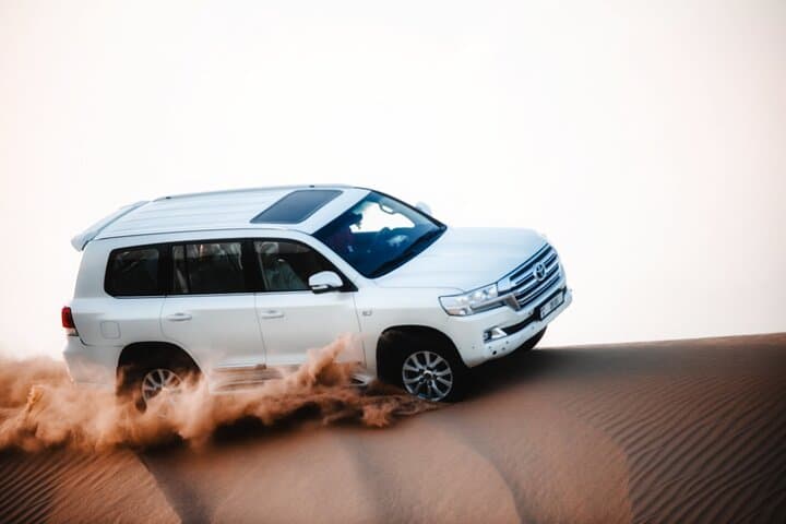 Evening Red Dune Safari in Dubai — Dune Bashing, Sandboarding & Desert Camp Experience photo 5