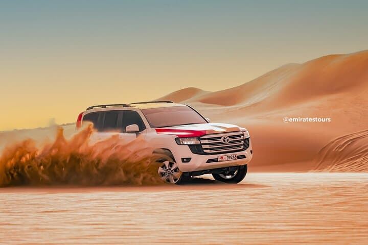 Evening Desert Safari Abu Dhabi: Dune Bashing, BBQ & Cultural Camp Experience