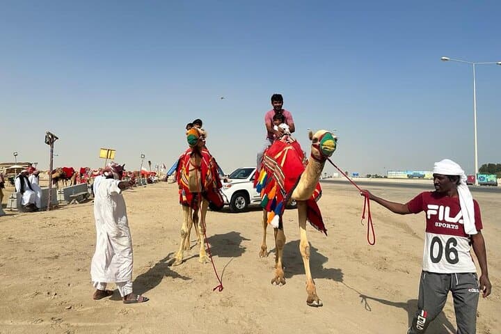 Qatar Desert Sunset: Camel Ride, Dune Bashing & Arabic Carpet Tea Experience photo 2