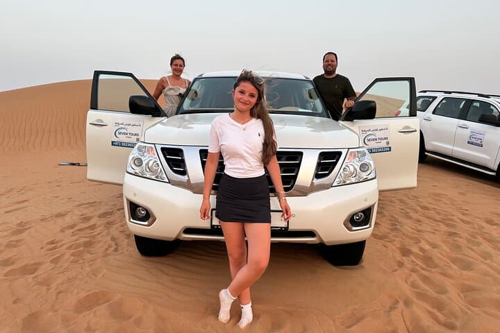 Dubai Red Dune Safari: Camel Ride, Sandboarding & BBQ Sunset Experience photo 4
