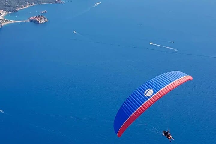 Soar over Budva: Tandem Paragliding from Bečići Beach photo 5