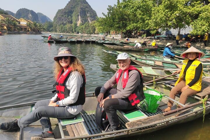 Tam Coc, Mua Cave & Hoa Lu Day Tour from Hanoi — Boat, Bike and Mua Peak photo 3