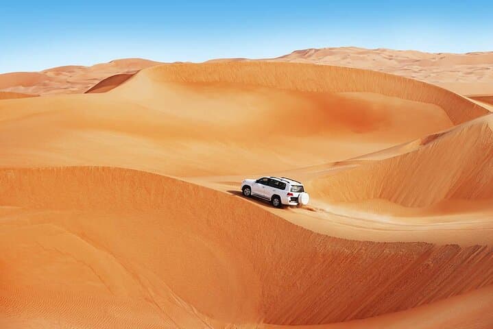 Doha Golden Dune Safari: Dune Bashing, Sandboarding & Inland Sea Adventure photo 1