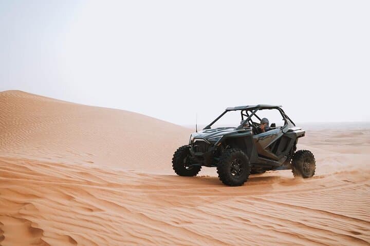 Morning Red Dunes Buggy Ride, Sandboarding & Camel Experience in Dubai Desert