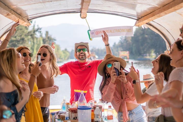 Xochimilco Canals: Trajinera Cruise with Mezcal, Food & Axolotl Visit