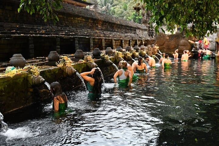 Cycling to Tirta Empul: Holy Water Blessing Bike Tour from Ubud photo 5