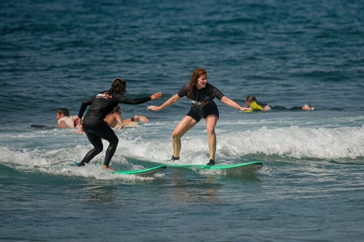 Learn to Surf in Playa de las Américas: Small-Group Lessons in Tenerife photo 4