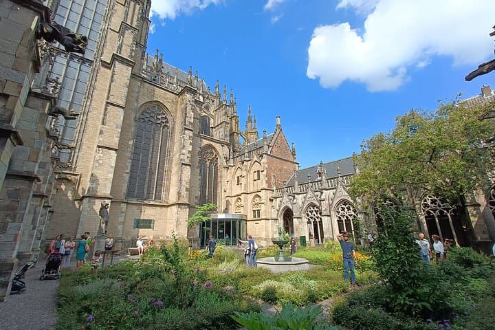 Utrecht Guided Highlights Walking Tour: Dom Tower, Canals & Hidden Gardens photo 4