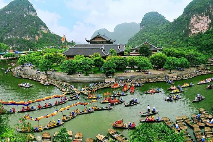 Luxury Ninh Binh Day Tour from Hanoi: Hoa Lu Temples, Trang An Boat & Countryside Bike photo 6