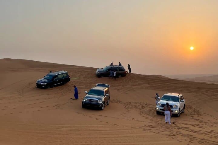 Dune Bashing to the Inland Sea: Doha Desert Safari with Camel Ride and Sandboarding photo 2