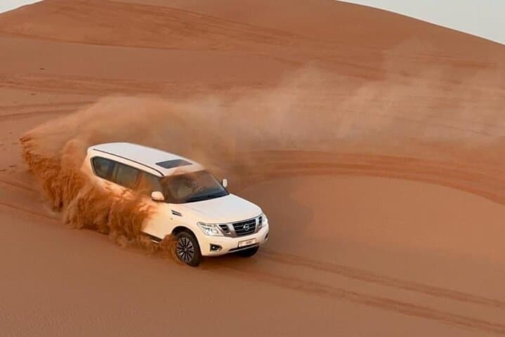 Dubai Evening Desert Safari: Dune Bashing, Camel Rides & Live Shows photo 2