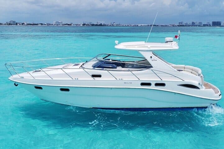 Private Yacht Charter in Cancun: 6-Hour Addictivo Cruise to Isla Mujeres