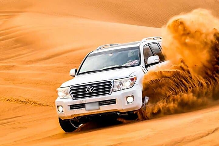 Private Dubai Desert Safari with Dune Bashing, Camel Ride & Bedouin Dinner