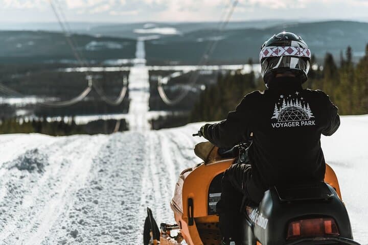 Full-Day Snowmobile Adventure in Sollefteå: Voyager Park Ice Fishing & Sauna