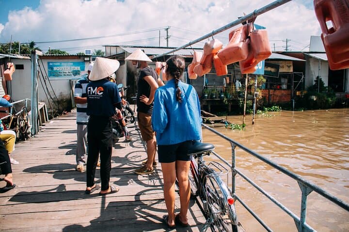 Can Tho Cycling Through Village, Dragon-Fruit Gardens and Local Ferry photo 4