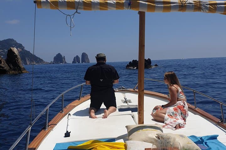 Capri Private Boat Tour: 2-Hour Gozzo to the Blue Grotto & Faraglioni photo 1