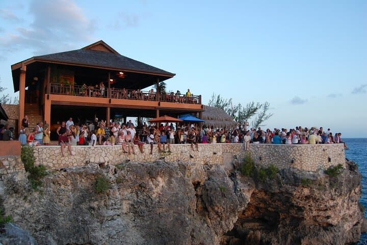 Experience Jamaica: Relax on Negril's 7 Mile Beach and Dive Into Adventure at Rick's Cafe photo 4