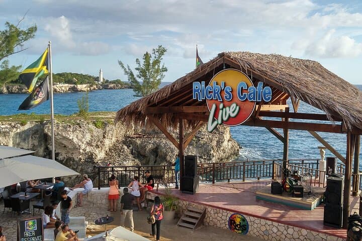 Experience Jamaica: Relax on Negril's 7 Mile Beach and Dive Into Adventure at Rick's Cafe
