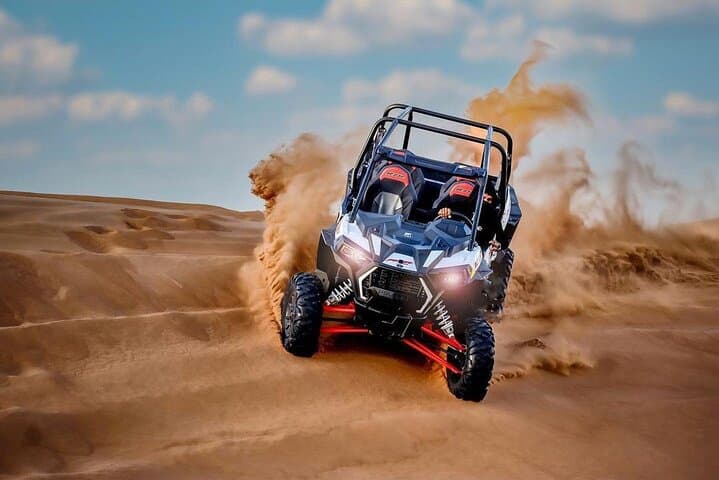 Sunset Dune Buggy Adventure in Dubai: Sandboarding, Camel Ride & Sunset Photos
