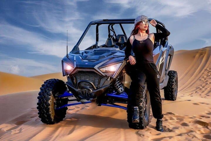 Sunset Dune Buggy Adventure in Dubai: Sandboarding, Camel Ride & Sunset Photos photo 2