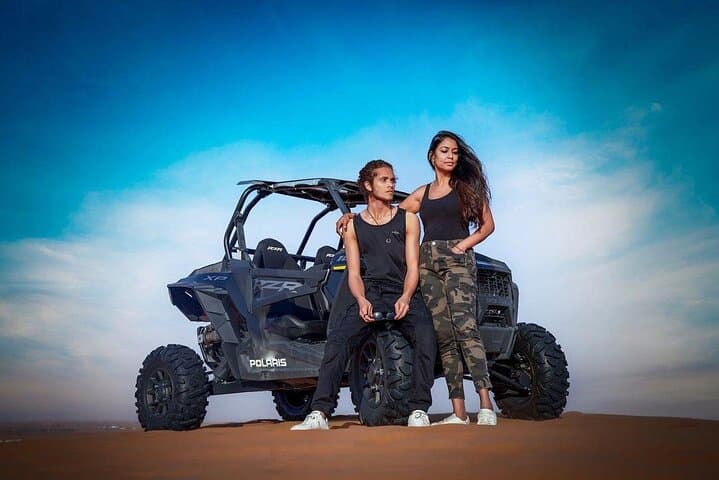 Sunset Dune Buggy Adventure in Dubai: Sandboarding, Camel Ride & Sunset Photos photo 3