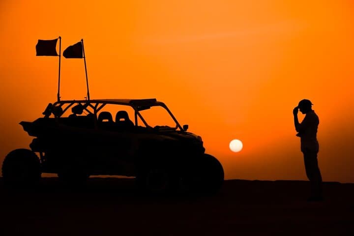 Sunset Dune Buggy Adventure in Dubai: Sandboarding, Camel Ride & Sunset Photos photo 4