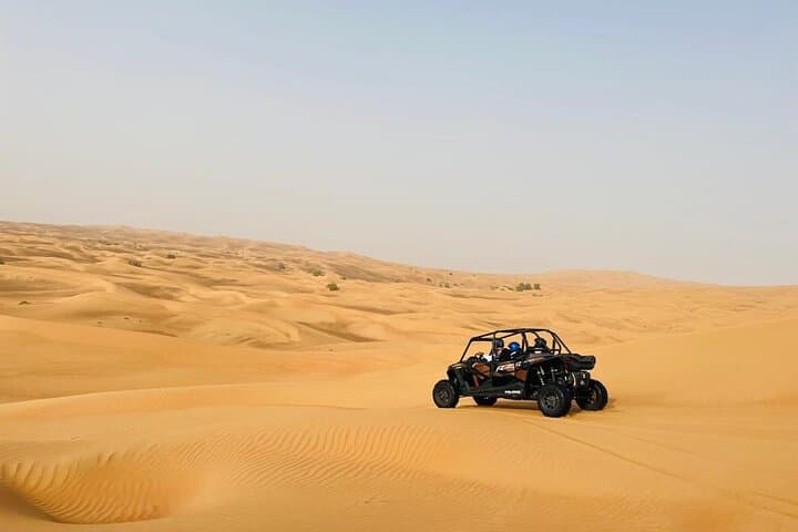 Sunset Dune Buggy Adventure in Dubai: Sandboarding, Camel Ride & Sunset Photos photo 5