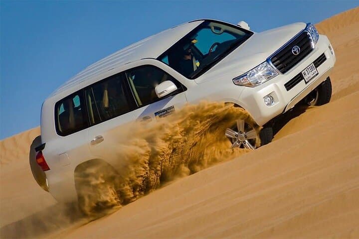 Dubai Sunset Desert Safari: Camel Rides, Sandboarding & BBQ Experience