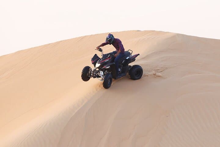 Evening Desert Safari & Quad Bike Ride in Dubai — Sunset Dunes, BBQ & Live Shows photo 1