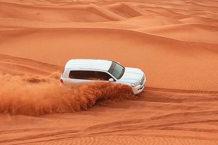 Dubai Red Dunes Safari: Camel Ride, Sandboarding & Sunset BBQ Experience photo 5