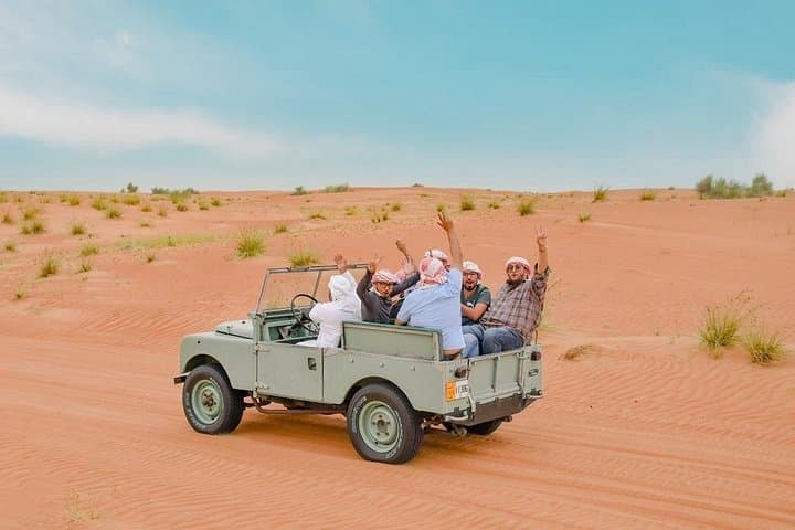 Private Dubai Heritage Desert Safari: Vintage Land Rovers, Falconry & Arabian Dinner photo 1