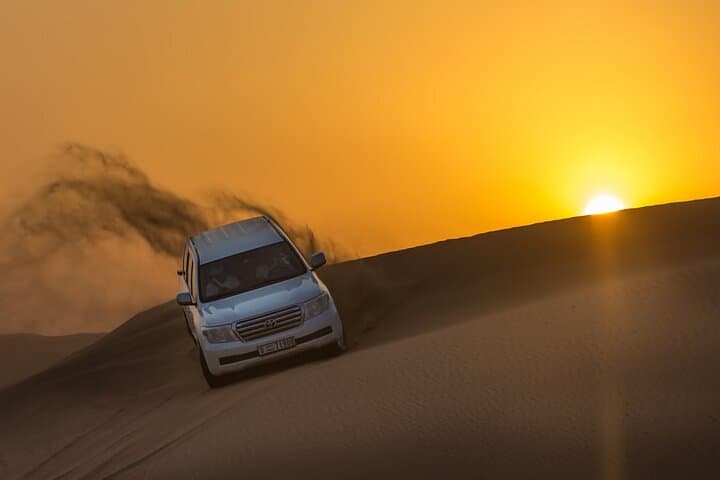 Dubai Sunrise Desert Safari: Early-Morning Dune Bashing & Camel Ride Guide photo 1