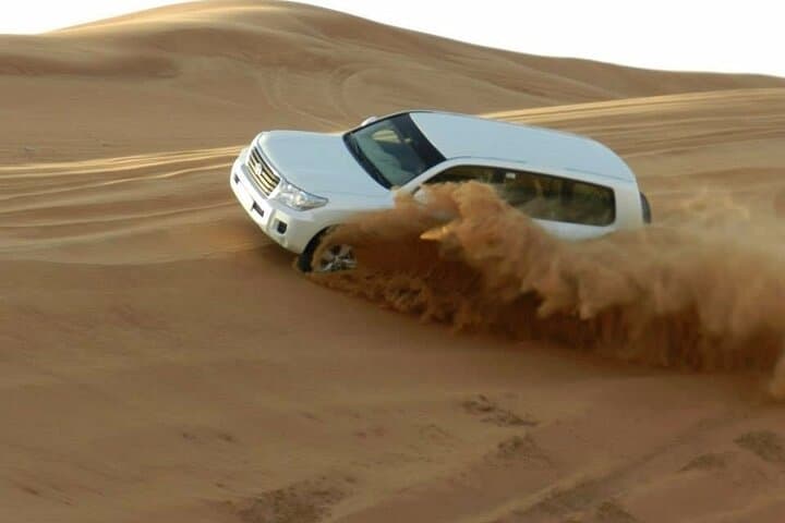 Overnight Desert Safari & Inland Sea Camp: Dune Bashing, Camel Ride & Stargazing photo 6