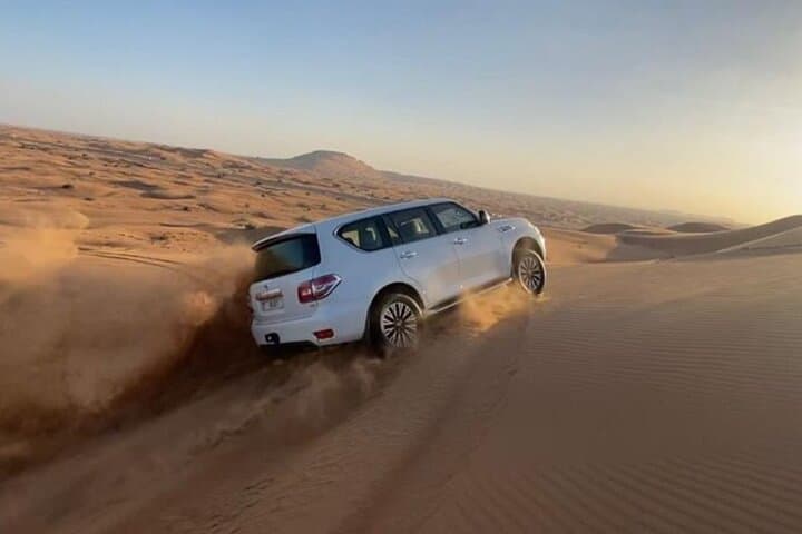 Abu Dhabi to Dubai Desert Safari: Dune Bashing, Sunset & Bedouin Camp Experience photo 2