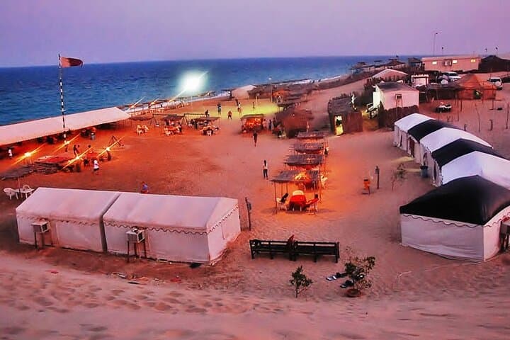 Overnight Desert Safari & Inland Sea Camp: Dune Bashing, Camel Ride & Stargazing photo 2