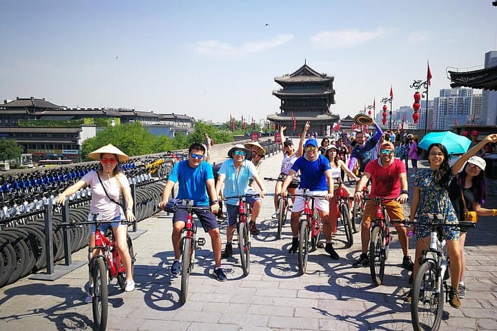 Xi'an City Wall Morning Bike & Bell Tower Walking Tour — Ride, Food Markets, Local History