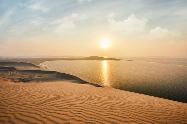 Sunrise and Sunset Desert Safari in Qatar: Dune Bashing to the Inland Sea