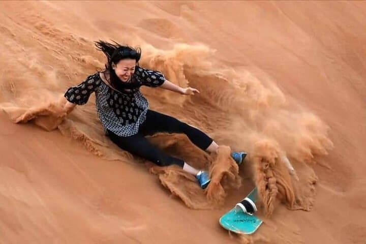 Morning Red Dune Safari: Camel Ride, Sandboarding & Dune Bashing in Dubai photo 4