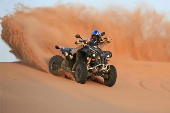 Morning Red Dune Safari: Camel Ride, Sandboarding & Dune Bashing in Dubai photo 2