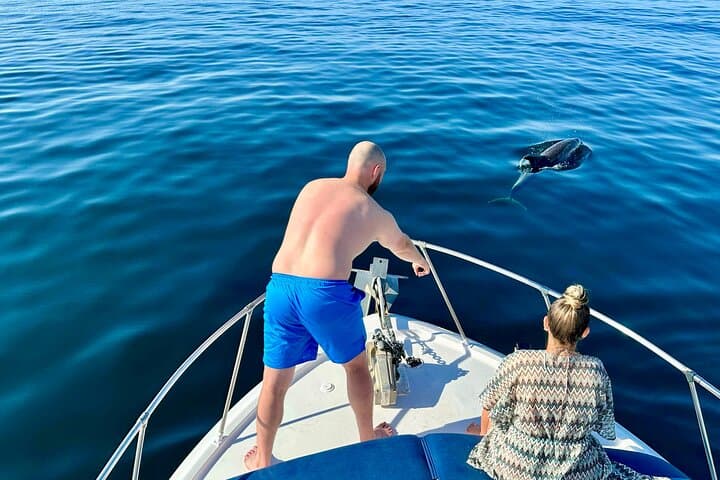 Benalmádena Coastal Boat Tour — Dolphins, Shipwreck Snorkel & 20‑ft Water Slide photo 3