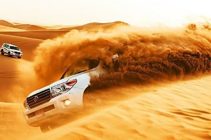 Dubai Desert Safari with BBQ Dinner: Dune Bashing, Camel Rides & Evening Shows photo 3