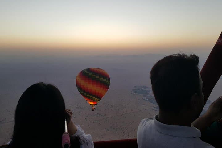 Sunrise Hot Air Balloon Over Dubai Desert: 1-Hour Flight, Breakfast & Falcon Show photo 1