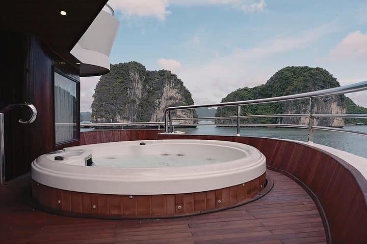 Overnight Ha Long Bay Cruise with Balcony: Kayaks, Caves & Ti Top Views photo 4