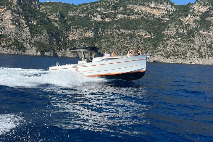 Private Full-Day Capri Boat Tour from Positano — Faraglioni, Grottos & Snorkeling photo 3