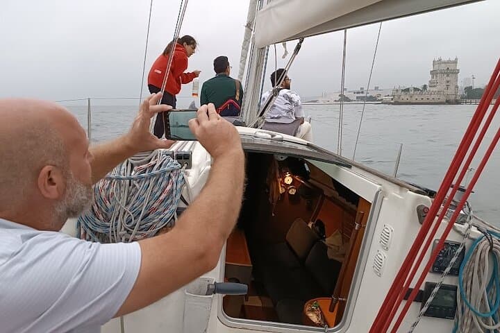 Sunset Sail on the Tagus: Private Lisbon Sailboat Tour with Welcome Drink