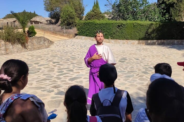 Walk with Hadrian: Private Theatrical Journey Through Italica's Roman Ruins photo 2