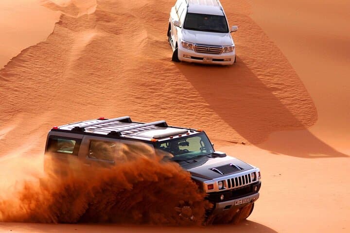 Abu Dhabi Desert Safari: Dune Bashing, Sandboarding & BBQ Under Desert Skies photo 2